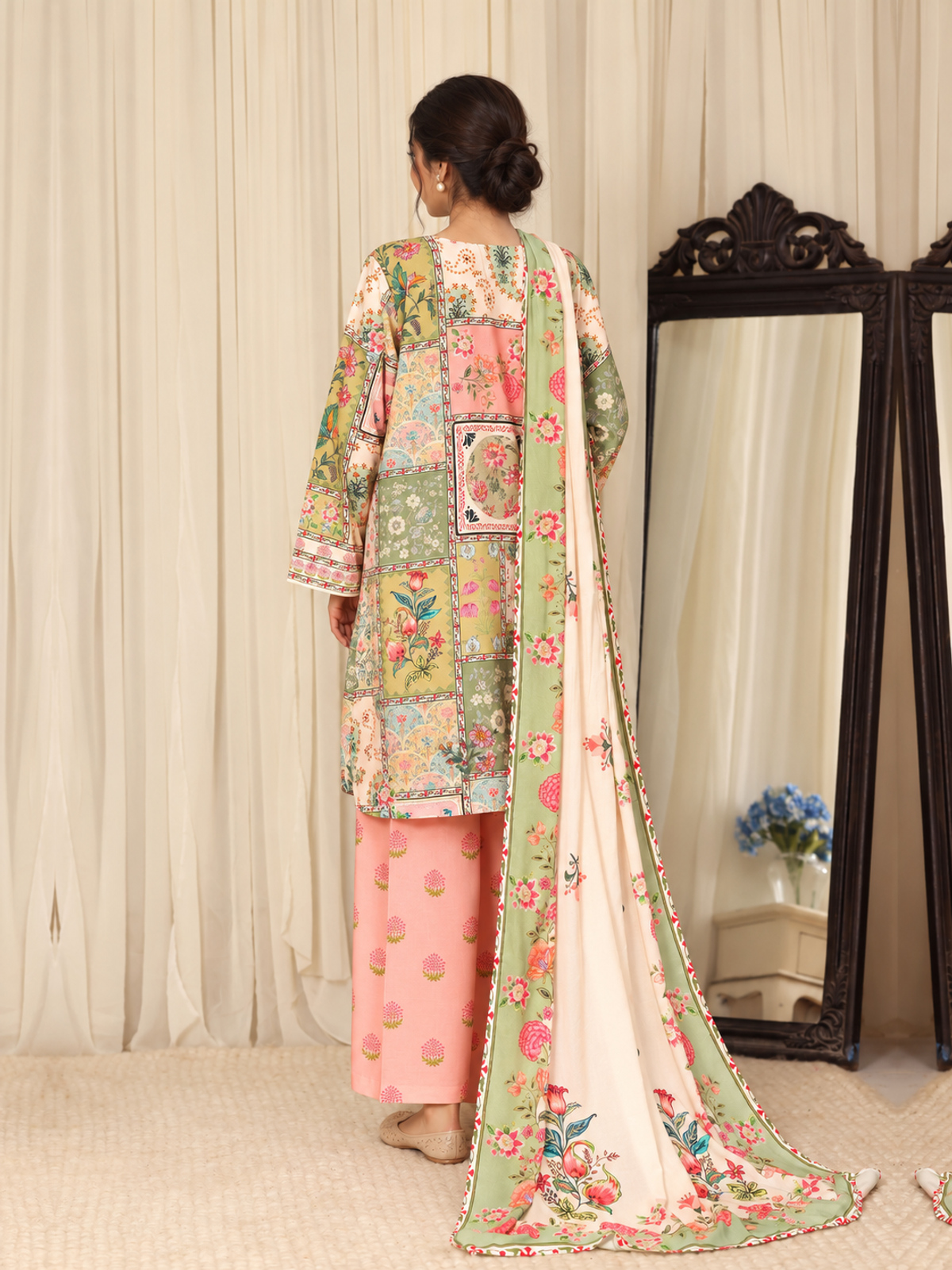 A multicolour patchwork-style floral shirt with pink printed trousers…