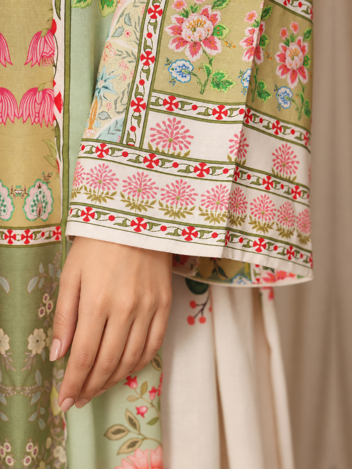 A multicolour patchwork-style floral shirt with pink printed trousers…
