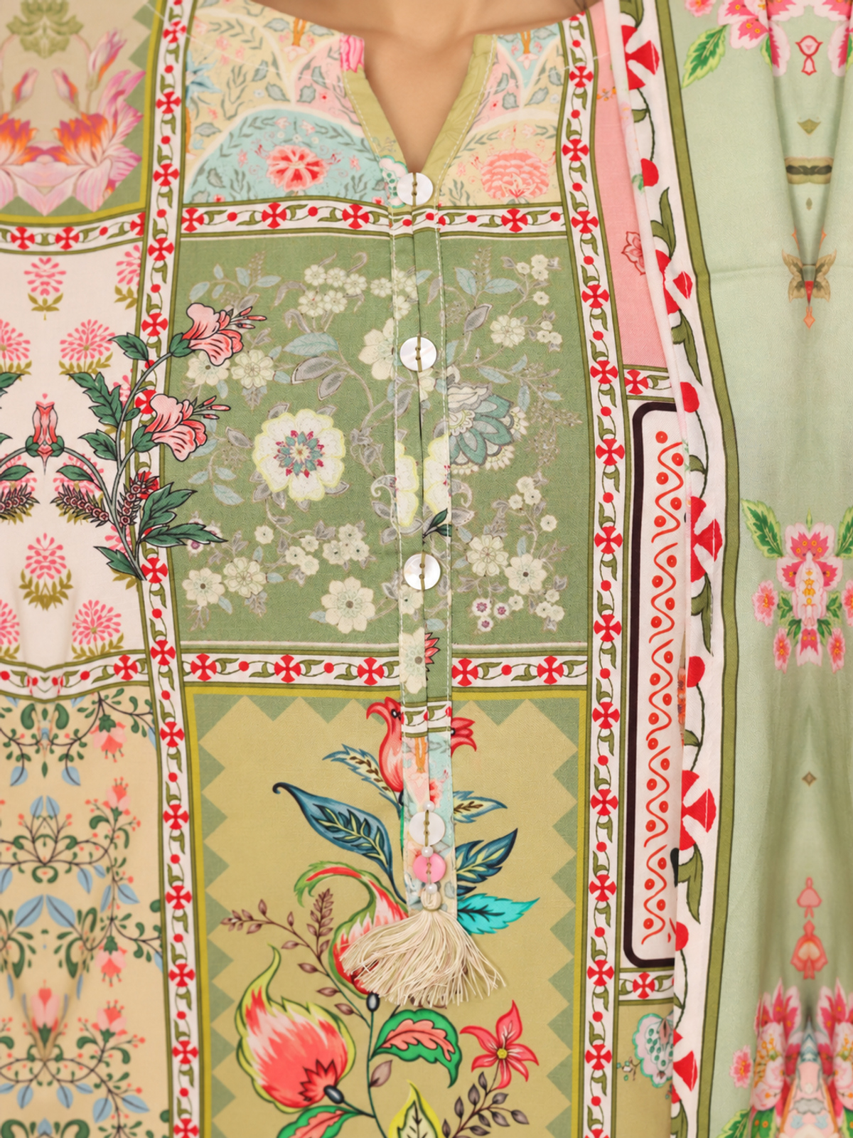 A multicolour patchwork-style floral shirt with pink printed trousers…